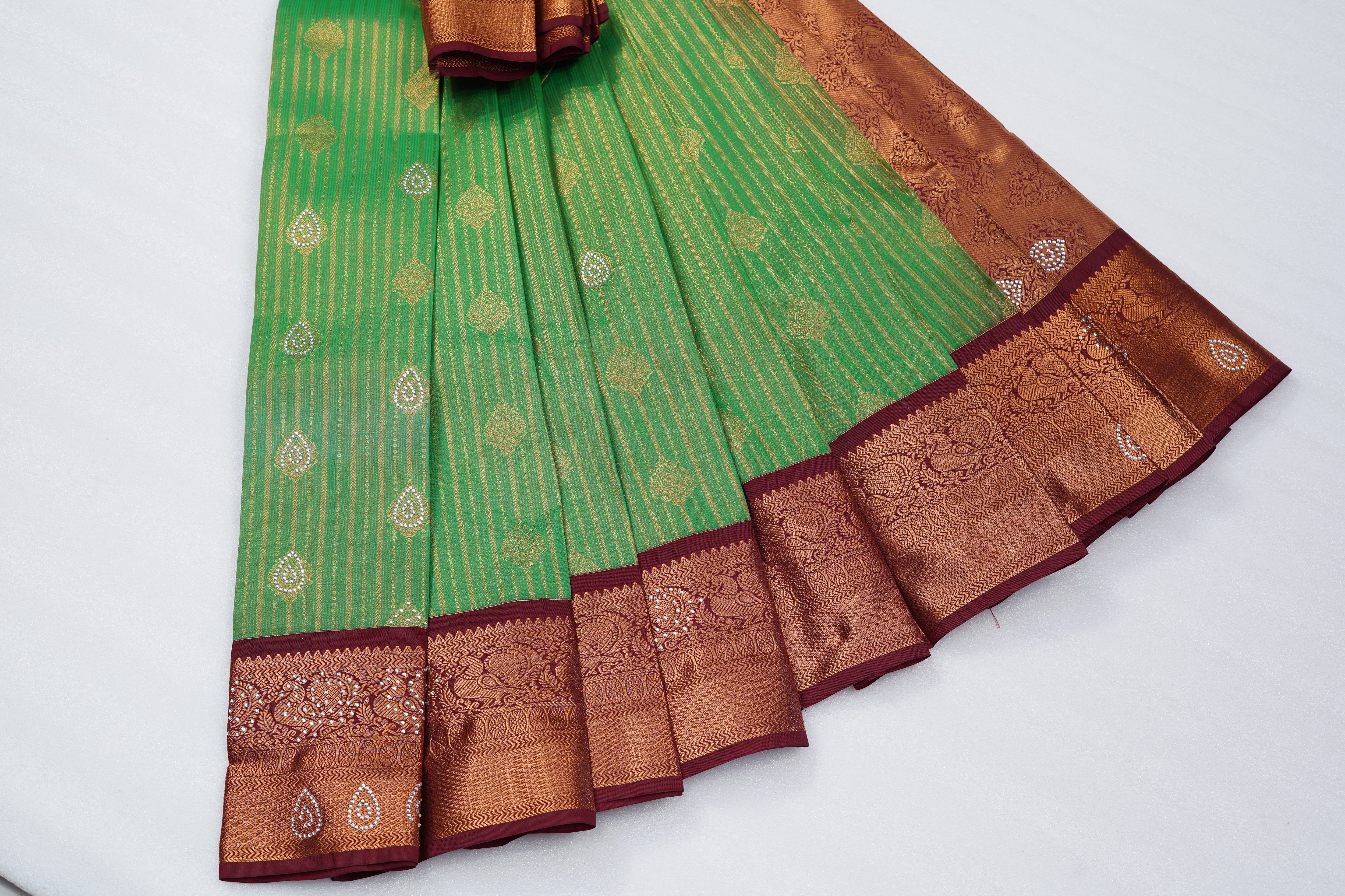 Green Art Silk Saree with Gold Stripes, Paisley Buttas and Rich Maroon Zari Border