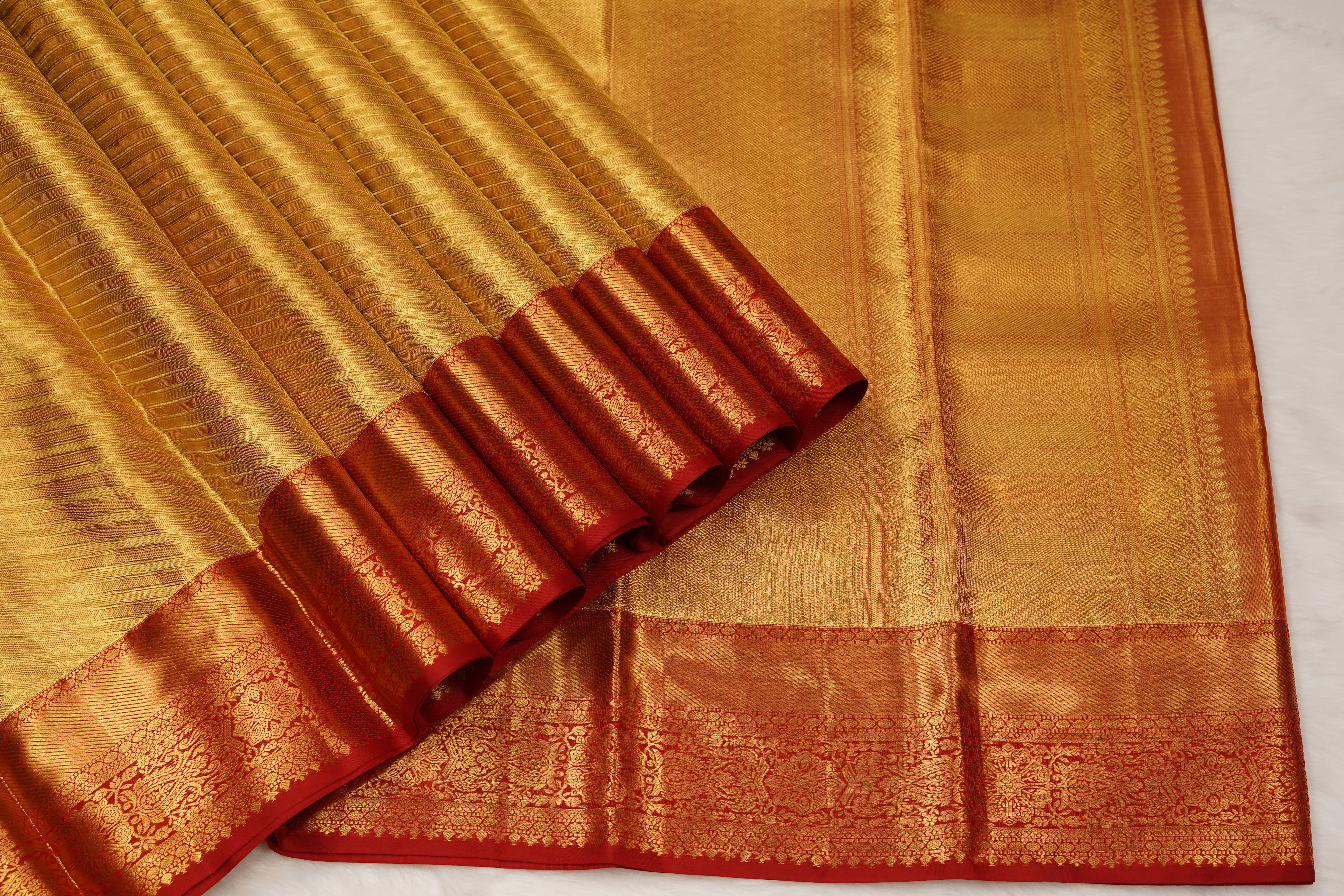 Gold & Red Pure Silk Saree with Diagonal Weave Body and Traditional Zari Border
