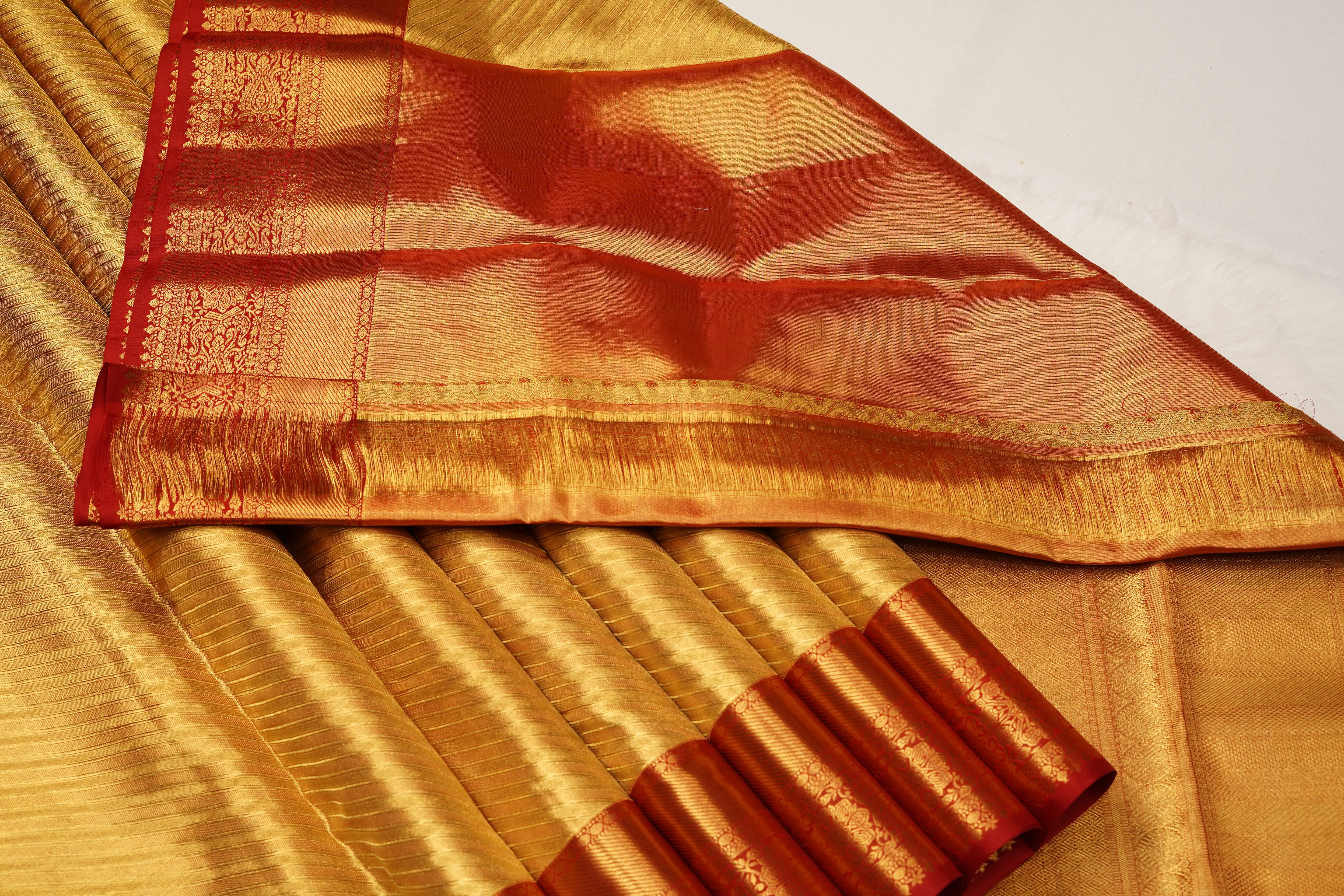 Gold & Red Pure Silk Saree with Diagonal Weave Body and Traditional Zari Border