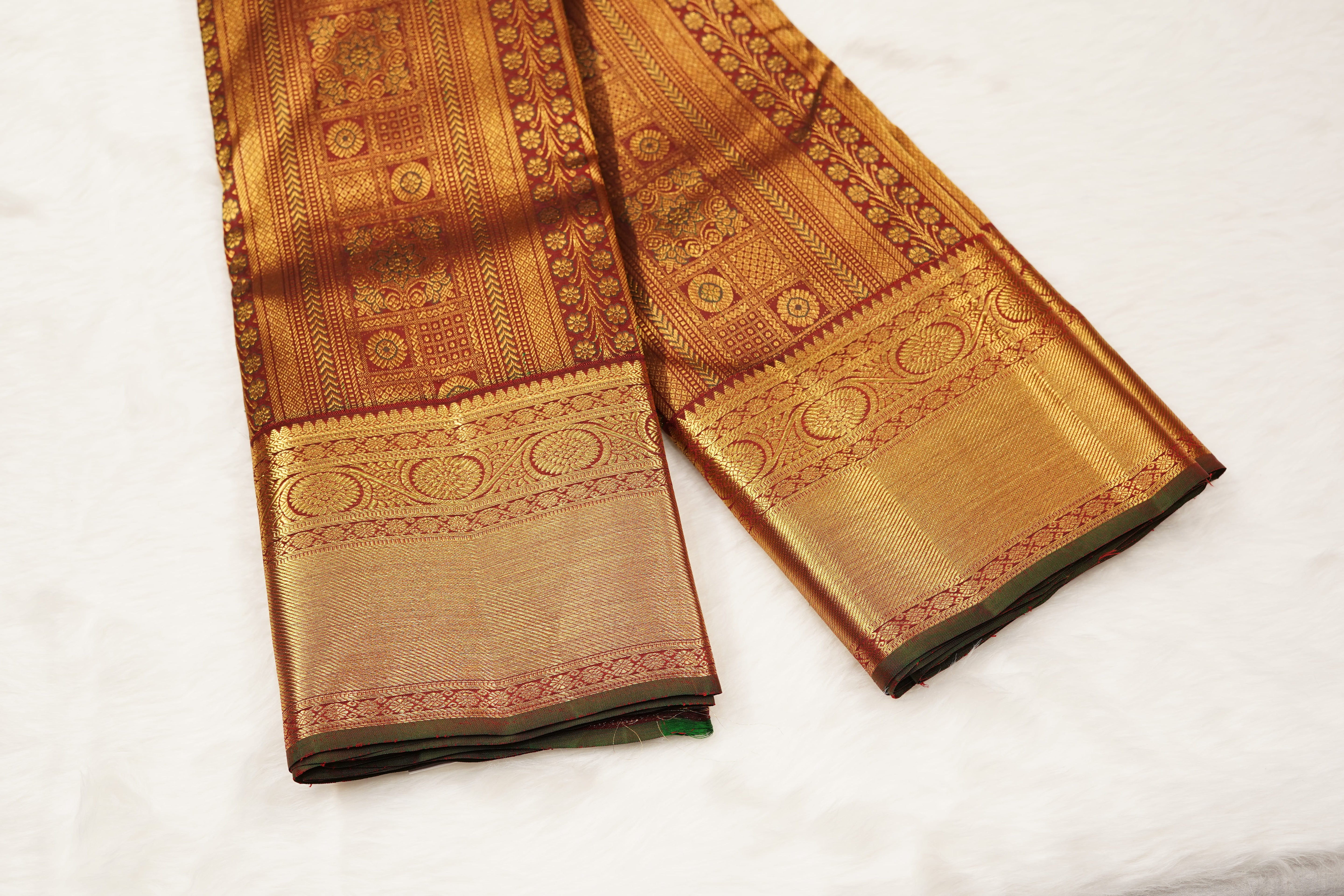 Maroon Pure Silk Saree with Intricate Zari Checks, Floral Motifs & Grand Traditional Pallu