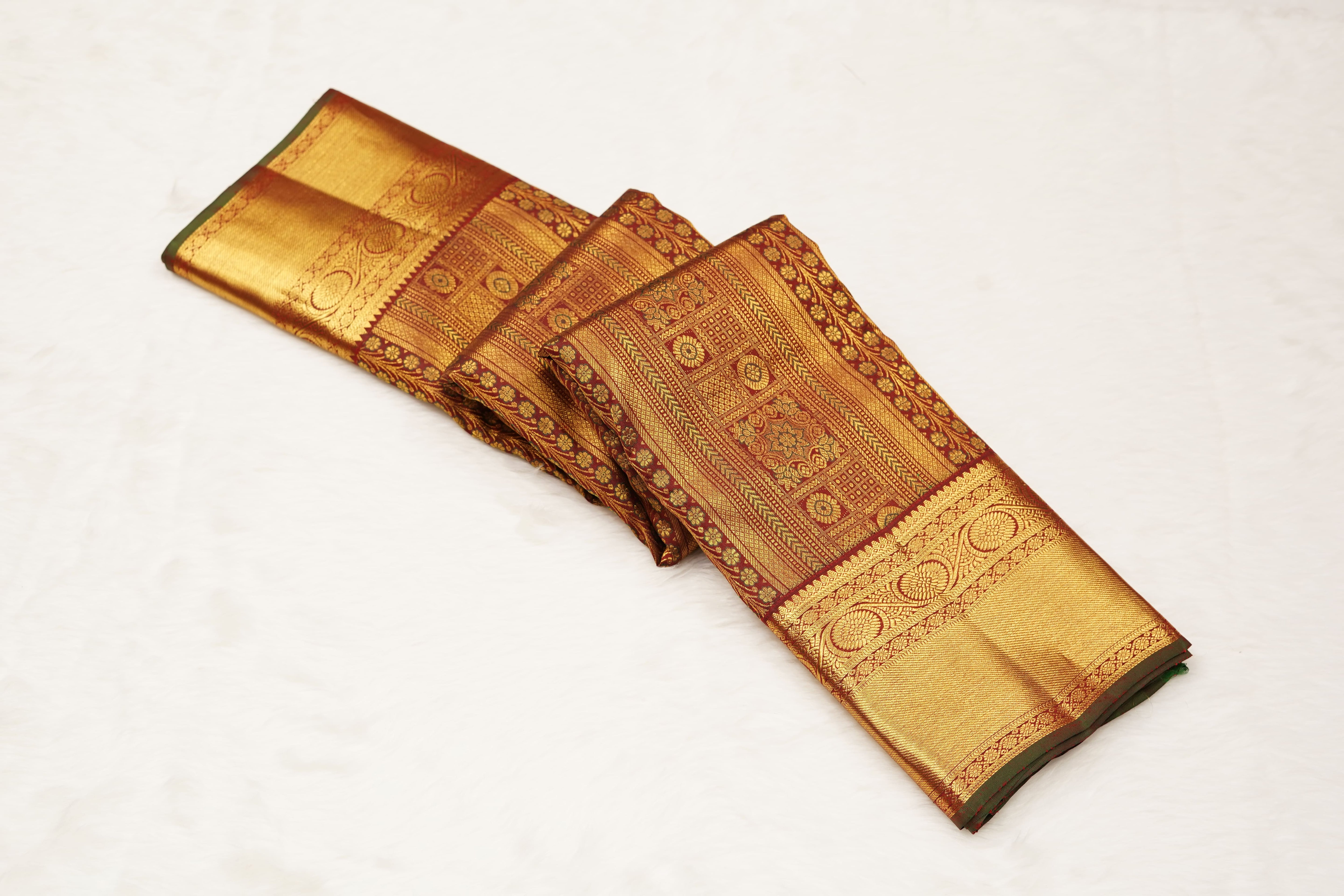 Maroon Pure Silk Saree with Intricate Zari Checks, Floral Motifs & Grand Traditional Pallu