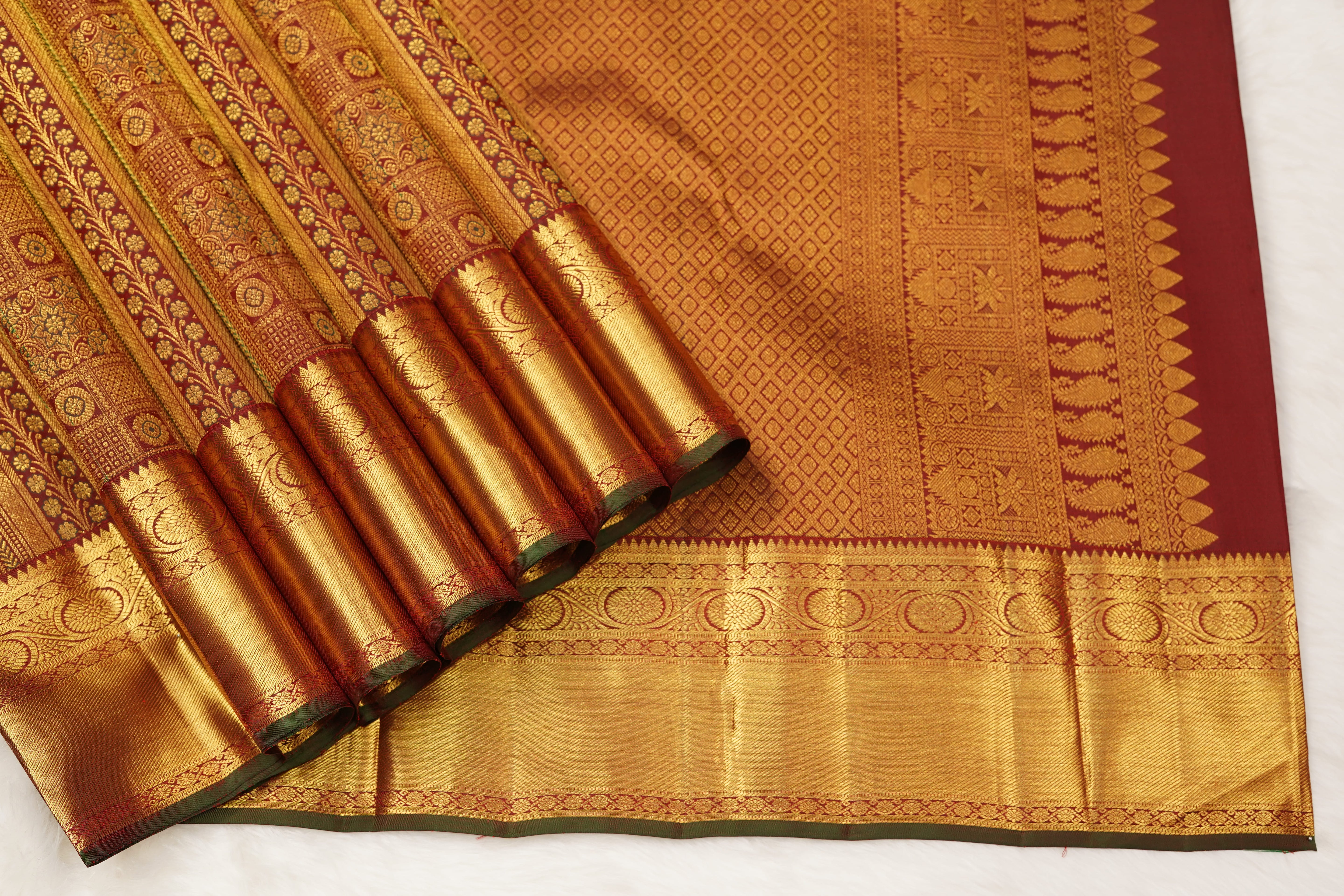 Maroon Pure Silk Saree with Intricate Zari Checks, Floral Motifs & Grand Traditional Pallu