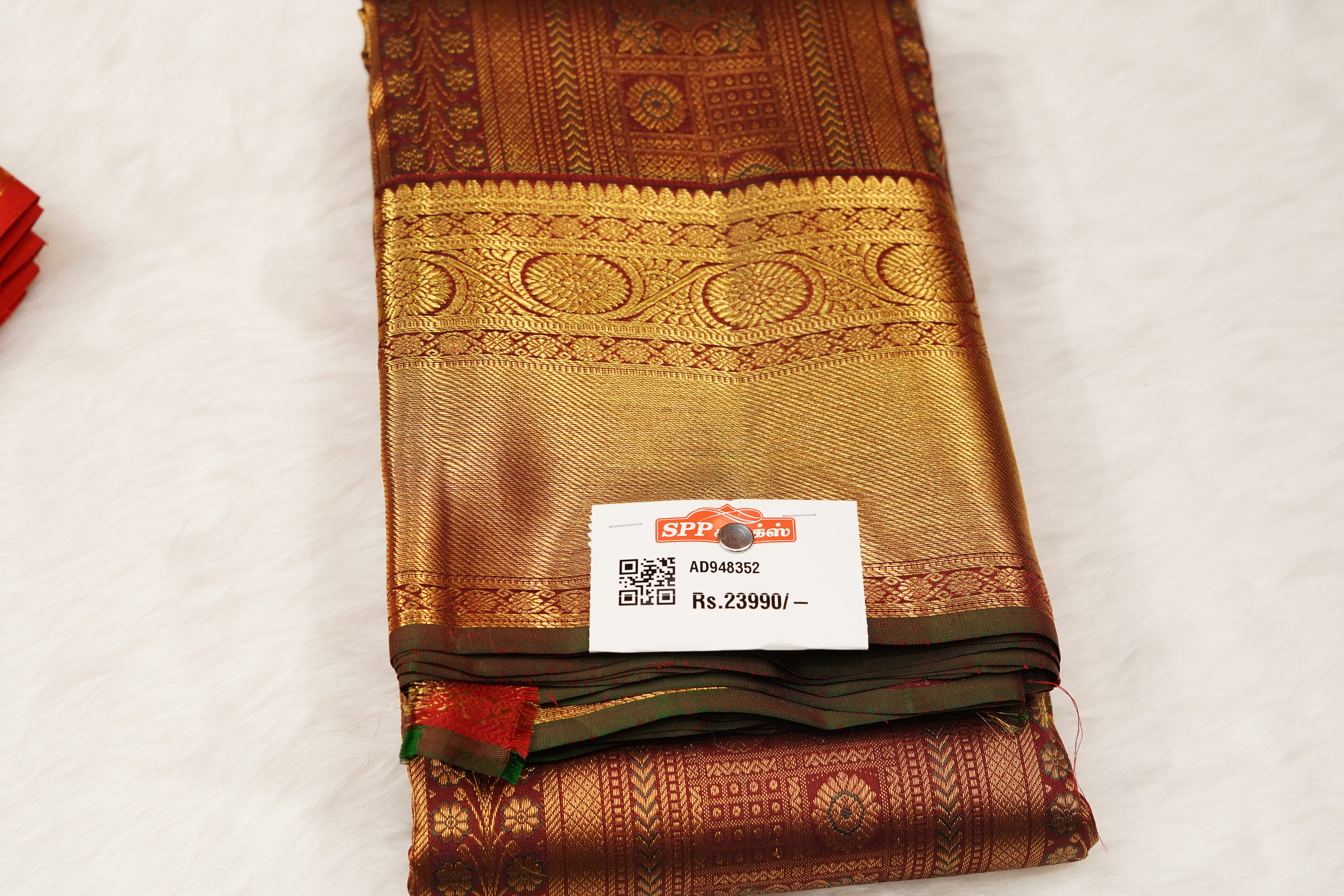 Maroon Pure Silk Saree with Intricate Zari Checks, Floral Motifs & Grand Traditional Pallu