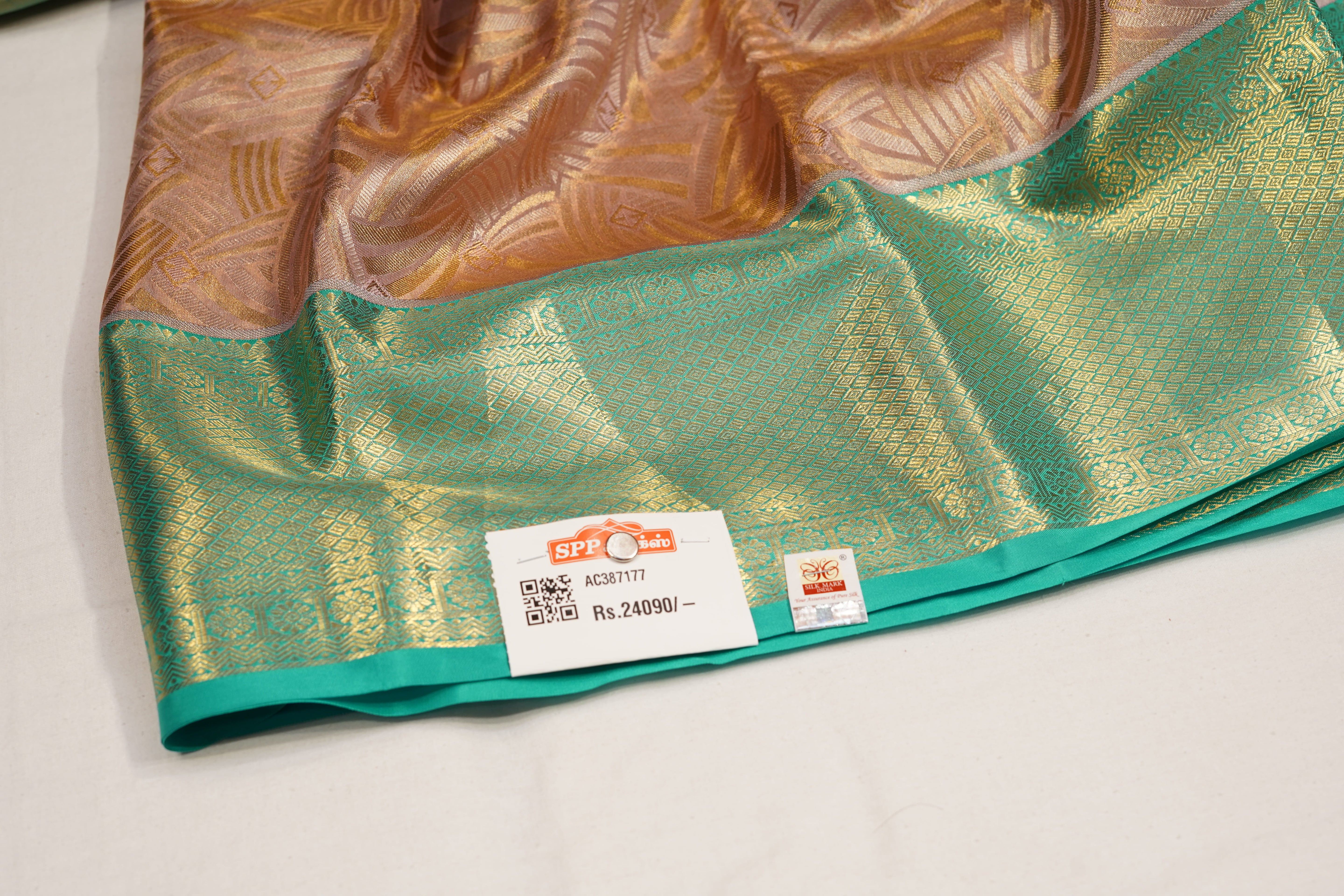 Peach & Sea Green Pure Silk Saree with Geometric Jacquard Body and Rich Zari Border