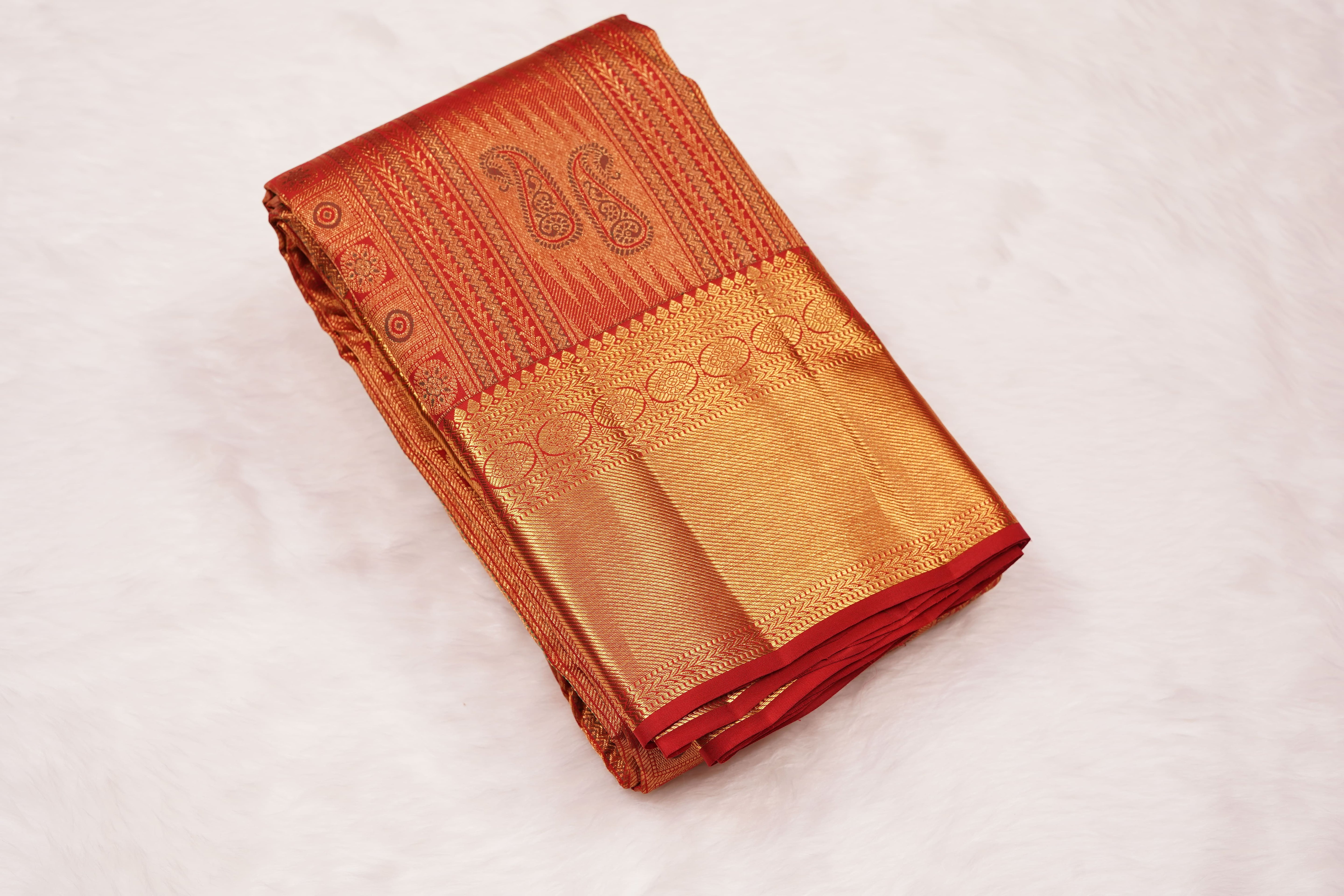 Red Pure Silk Saree with Intricate Paisley Zari Weave and Grand Traditional Border