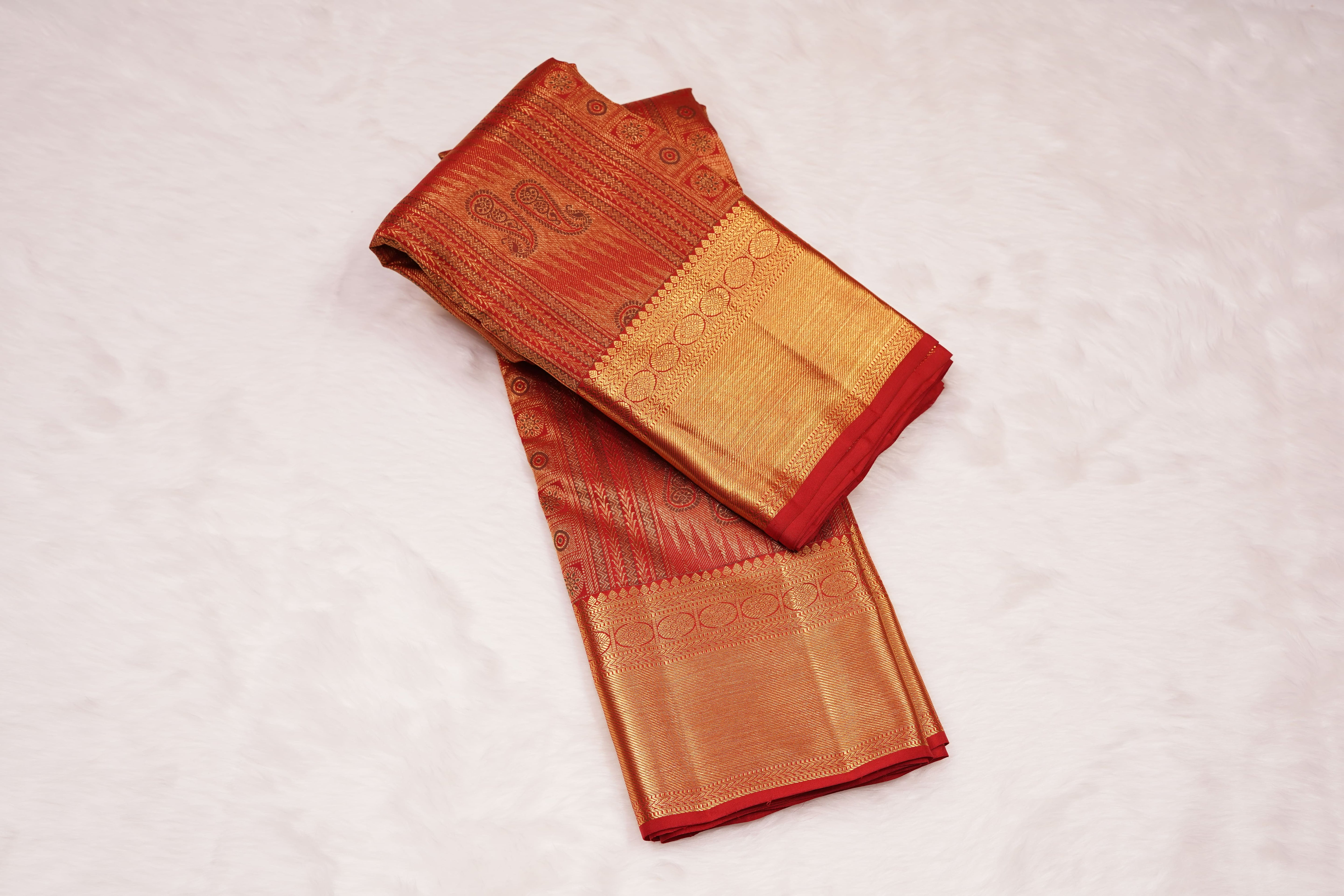 Red Pure Silk Saree with Intricate Paisley Zari Weave and Grand Traditional Border