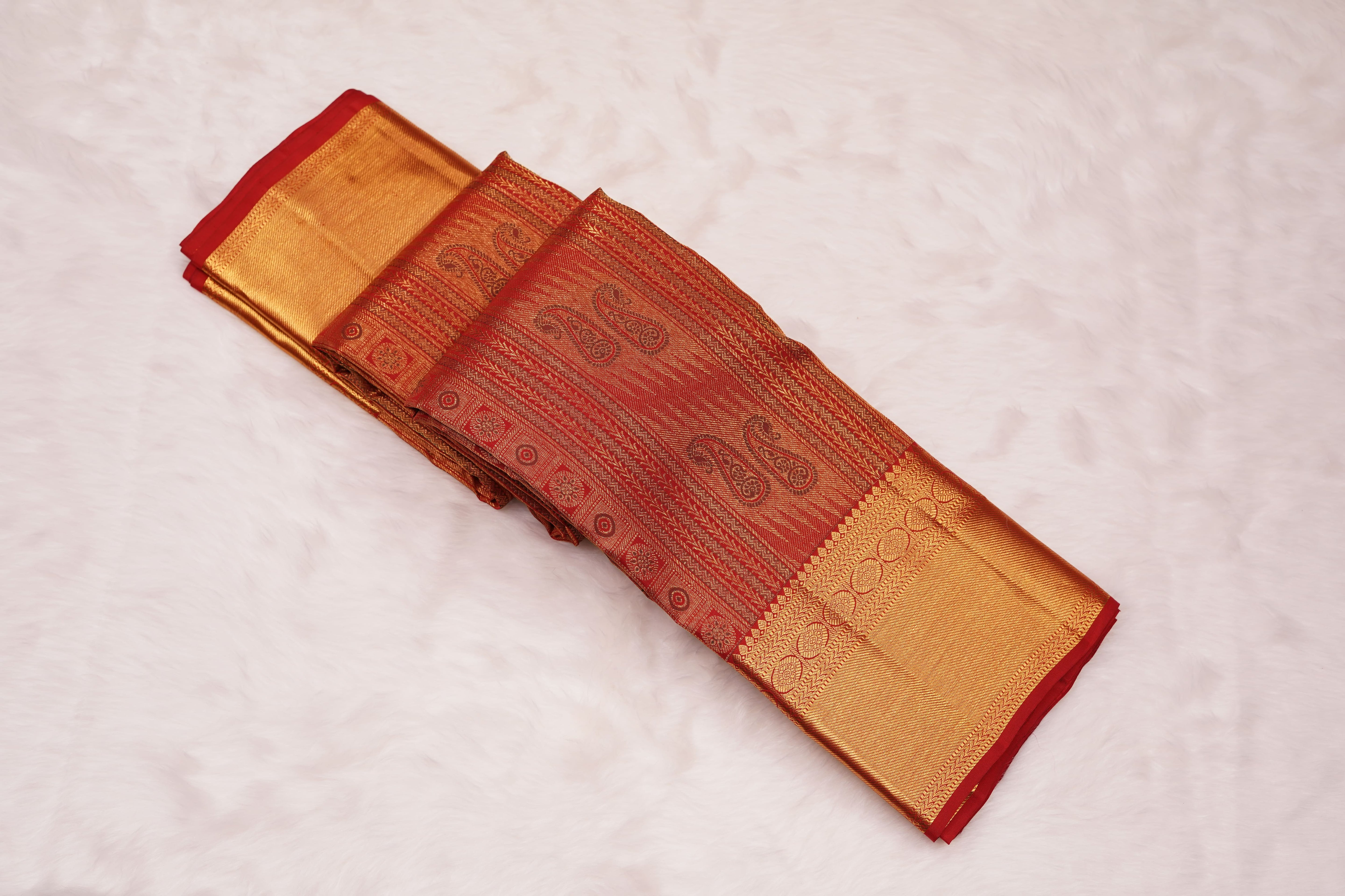 Red Pure Silk Saree with Intricate Paisley Zari Weave and Grand Traditional Border