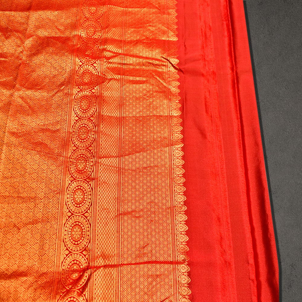 Dark Green Semi Silk Saree with Gold Buttas and Copper Zari Border